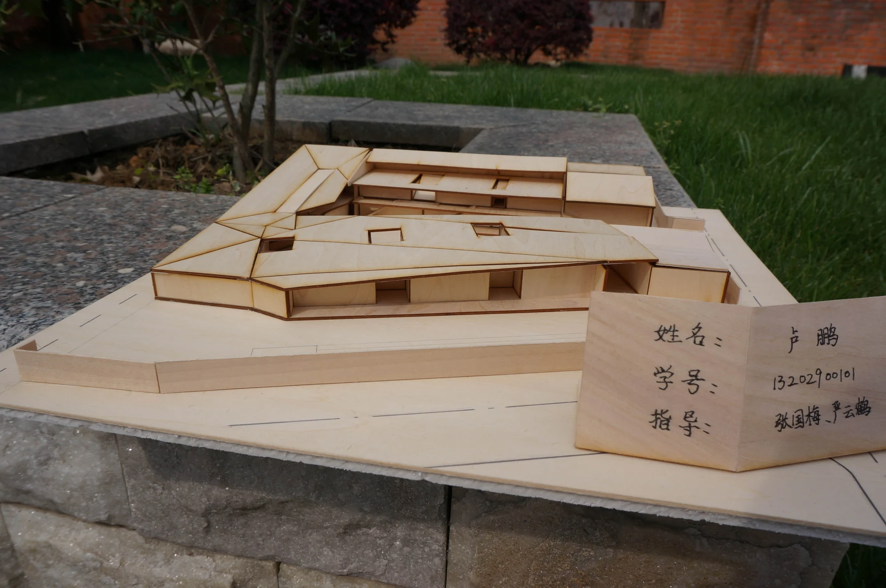Oblique outdoor photograph of the complete architectural model